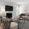 a living room with a fireplace