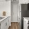 a kitchen with white cabinets