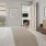 a bedroom with a bed and a picture