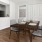 a dining room with a table and chairs